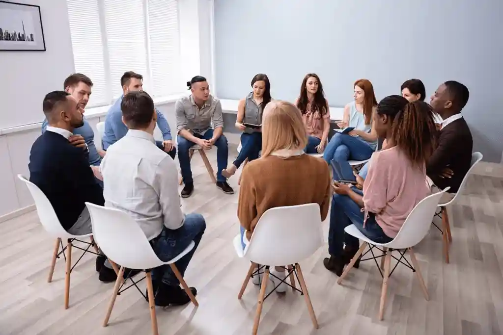 few people sitting together in drug rehab centers